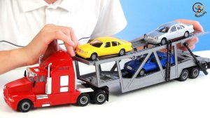 Открываем игрушки машинку. Автовоз с машинкамми. МанкиИгрушки.