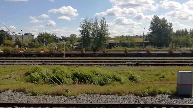 Рельсовоз повышенной вместимости под погрузкой на подъездных путях РСП-8. Ст. Филино Сев ж/д. смотреть онлайн