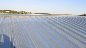 2700м.кв. Крыша из Пофнастила. Чем уплотнять зазор между коньком и листами из профнастила