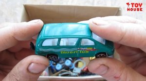 Box with toys. Robots, guns toys, military equipment, cars, spinner, action figures.