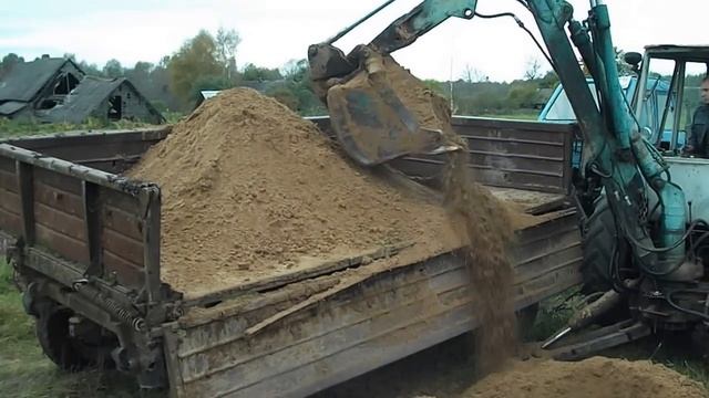 экскаватор ЮМЗ копает песок смотреть онлайн
