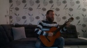 игра на гитаре. "Над окошком месяц." "Over the window a month."