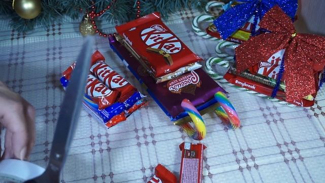 Сладкие сани.Сладкие сани из шоколада,с мешочком конфет. смотреть онлайн