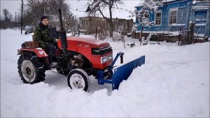 Испытание самодельного отвала с минитрактором синтай 220, расчистка снега