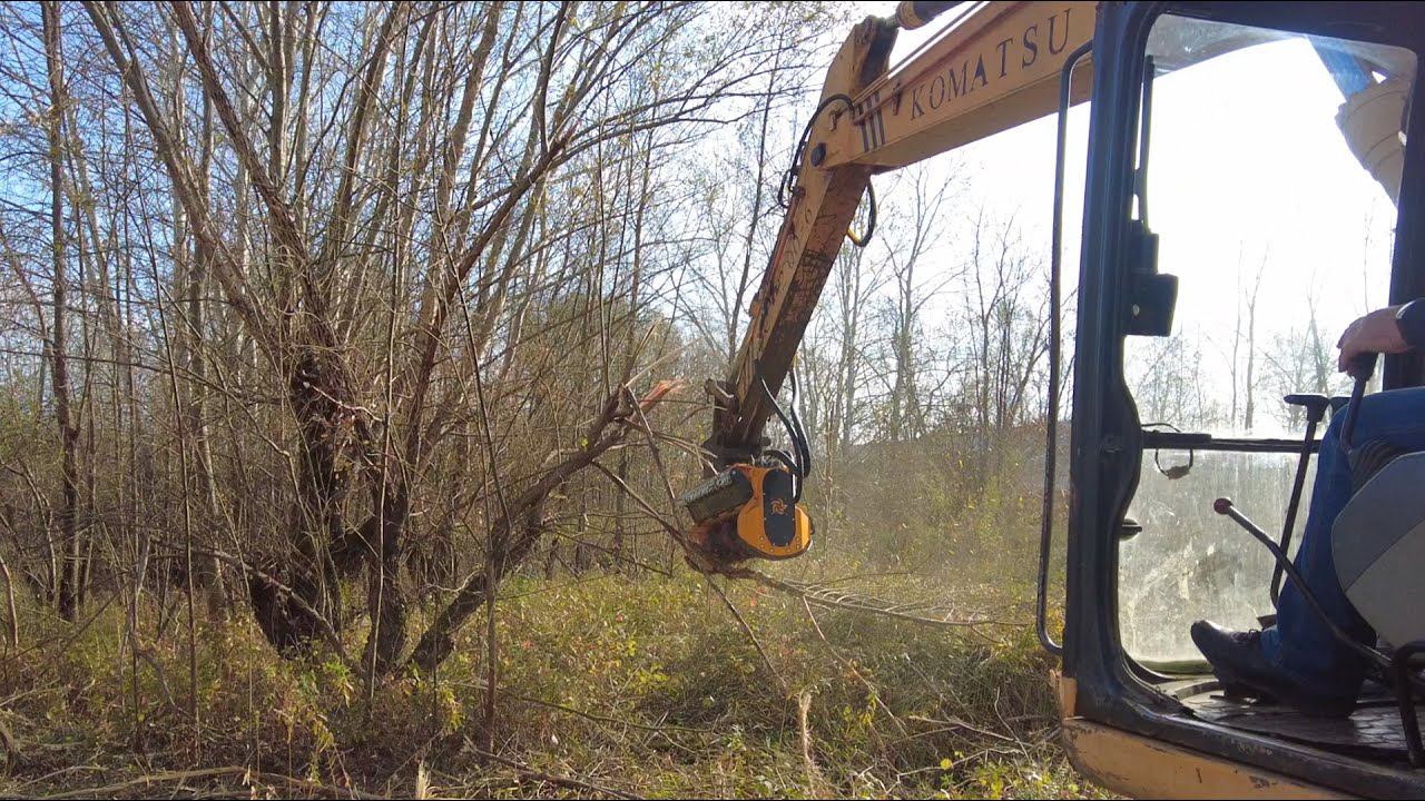 Экскаватор Komatsu PC 200  с гидравлическим мульчером FEMAC T15