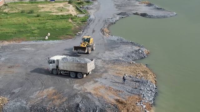 Updating New Achieved Deep Water Pond Reclamation Processing Wheel Loader Push Stone Leveling смотреть онлайн