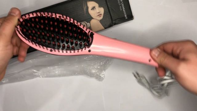 Видео обзор: Расческа выпрямитель Fast Hair Straightener. Цвет: розовый