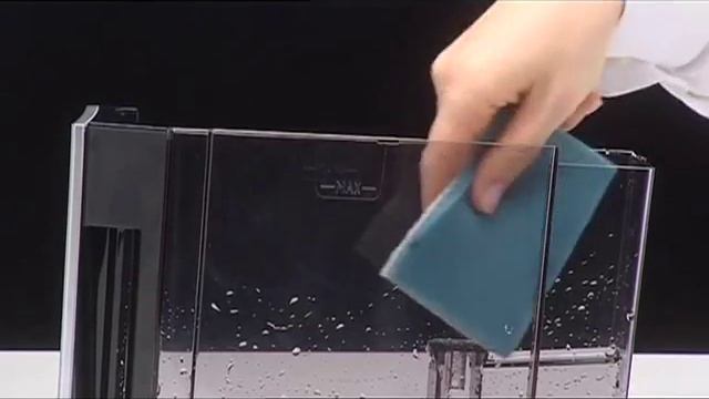 Cleaning the Coffee Grounds Container - ESAM 5600 смотреть онлайн