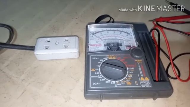 MEASURING VOLTAGE USING AN ANALOG MULTIMETER смотреть онлайн