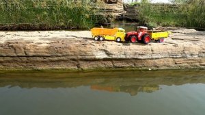 Возим дрова, тянем грузовичок из воды
