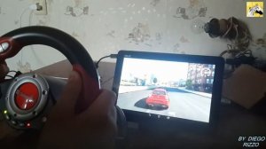 Играю в Андроид-планшете GT Racing 2:The Real Car Exp на РУЛЕ