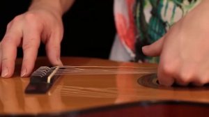 Регулировка высоты струн на классической гитаре.