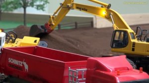 Радиоуправляемые грузовики, тракторы и экскаваторы в невероятном масштабе 1/32