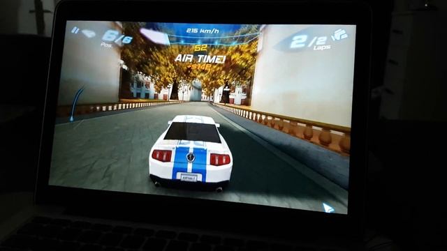 Asphalt 6 Adrenaline On Macbook Pro I5, 8gb, Intel Iris 6100. 6 Year Old Kid Driving .Not Bad! :)