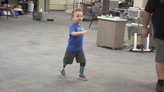 Kaleb walking on his own two (prosthetic) feet! смотреть онлайн