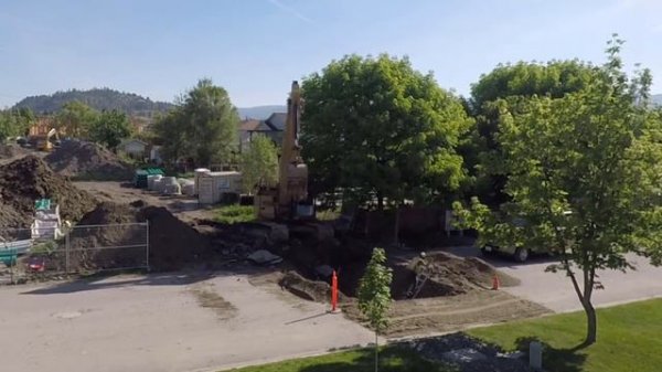 Cat 323F Excavator Digging a Hole