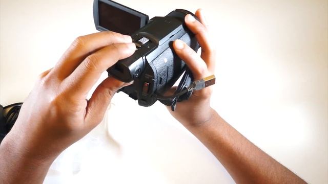 Sony HandyCam FDR Ax33 فتح صندوق كاميرا سوني смотреть онлайн