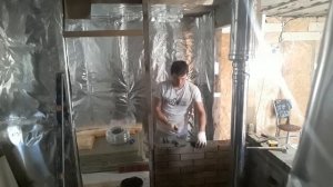 Перегородка из кирпича в парной. Защитный экран в бане.