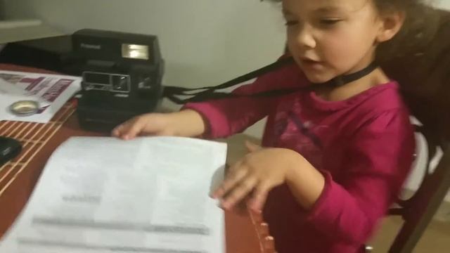 Sindy's First time using a Polaroid.