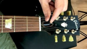 Как настроить прогиб грифа электрогитары