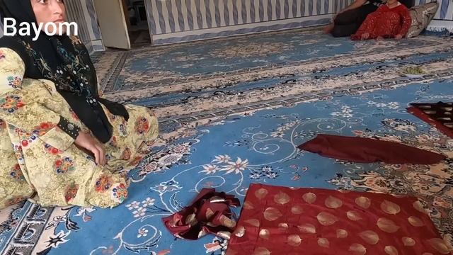 Sewing Local Clothes For A Small Family In The Mountains