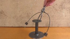 Штангист - неваляшка