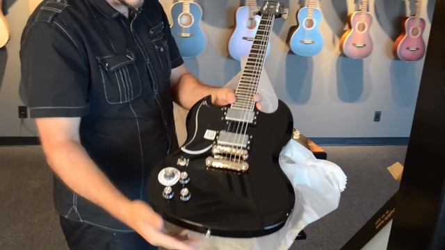 Unboxing a Lefthanded Epiphone Tony Iommi Signature SG Custom смотреть онлайн