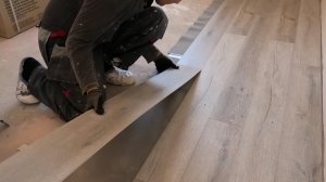 Укладка SPC ламината.