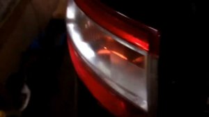 Как снять заднюю фару на Рено флюенс.