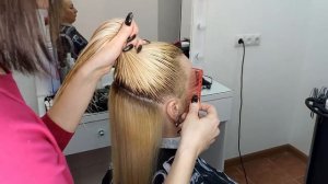 Стрижка на длинные волосы в технике слои.