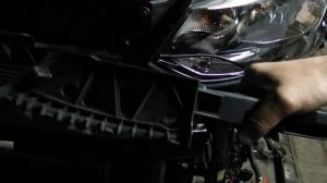 Пластиковое крепление для регулировки фар  на Volkswagen Polo.