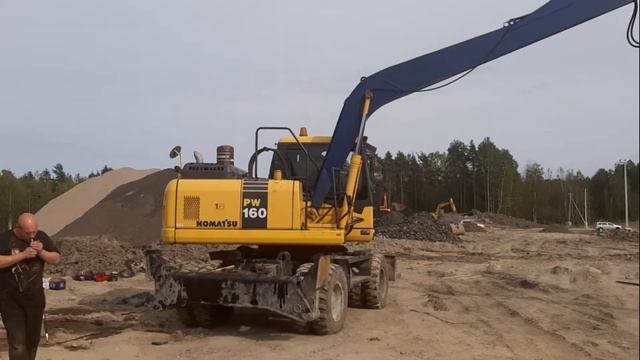 Komatsu PW 160. Часть 4. Техника в работе со стрелой 13 метров и планировочным ковшом. Вес 16 тонн. смотреть онлайн