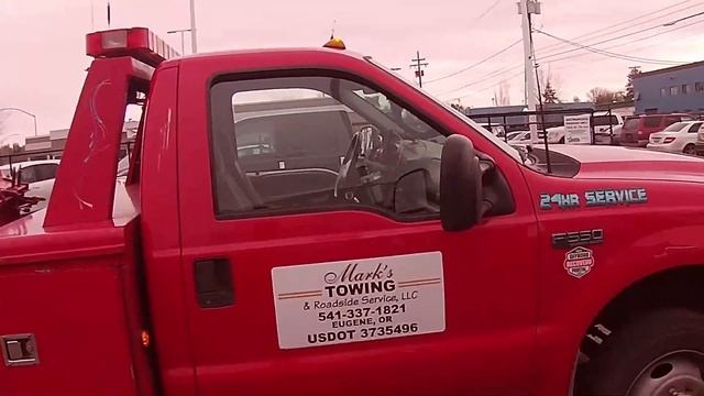 Mark's Towing And Roadside. Towing A 2016 Kia Sedona Burgundy