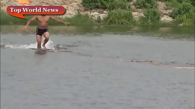 МОНАХ ПРОБЕЖАЛ 125 МЕТРОВ ПО ВОДЕ