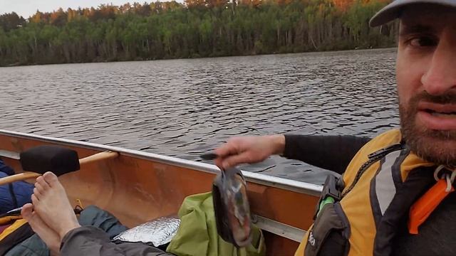 2 People Sleeping in a Canoe on the water смотреть онлайн
