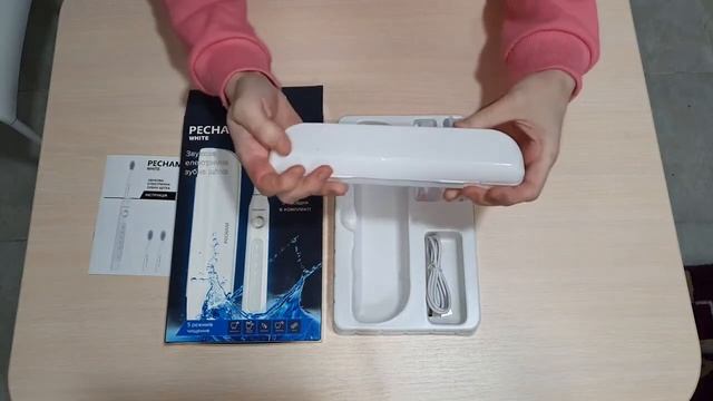 Распаковка электрической зубной щетки PECHAM White Travel смотреть онлайн