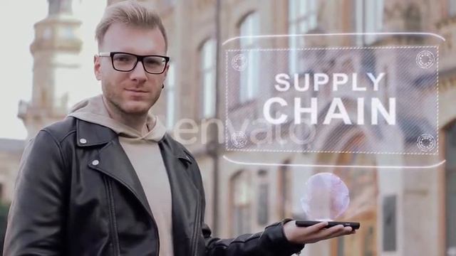 Smart Young Man with Glasses Shows a Conceptual Hologram Supply Chain | Motion Graphics - Videohive смотреть онлайн