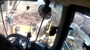 Планировка, погрузка грунта фронтальным погрузчиком L300F