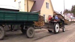 самодельный трактор с телегой.