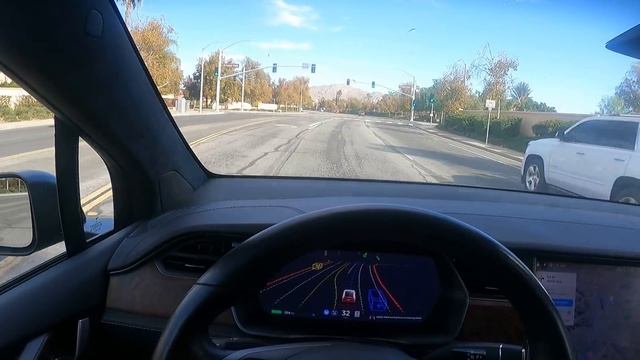Fsd beta 6 handling a right hand turn with red light and green for right turn смотреть онлайн