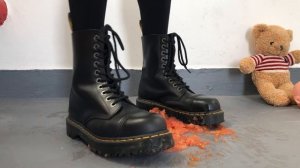 Dr. Martens boots crush tomatoes and teddy bear