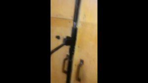 регулируемый запор на гаражные ворота