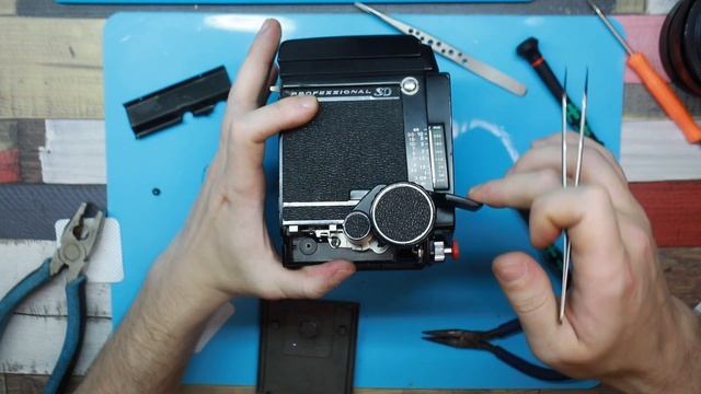 Mamiya RB67 Pro SD ремонт среднеформатной плёночной камеры смотреть онлайн