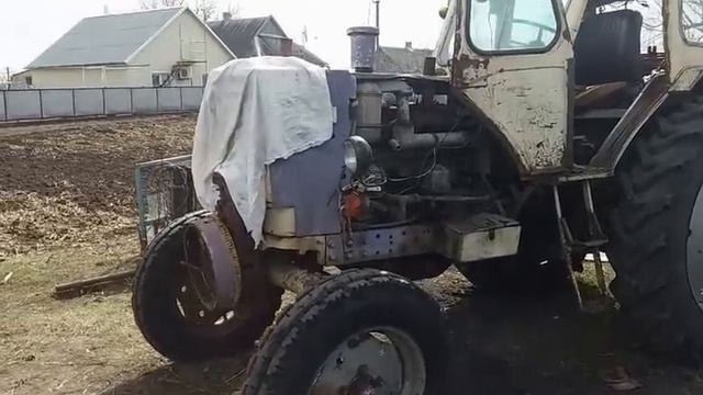 Замена масла в двигателе трактора ЮМЗ 6 и устранение течи воды в масло смотреть онлайн