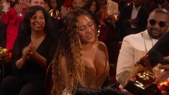 TREVOR NOAH Hands BEYONCÉ Her GRAMMY Award | 2023 GRAMMYs