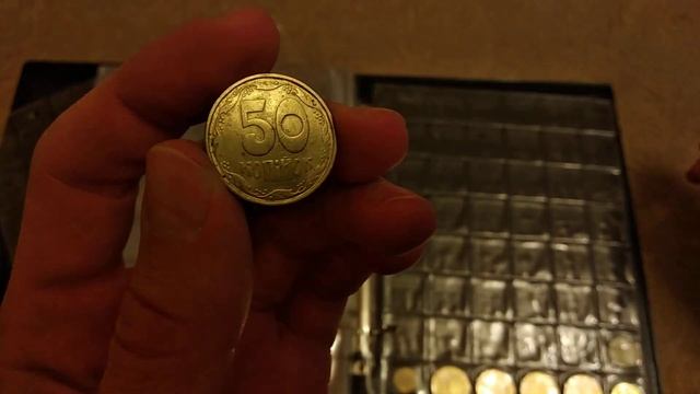 Как сохраняются в альбоме монеты Украины из обращения и unc из ролла 50 копеек