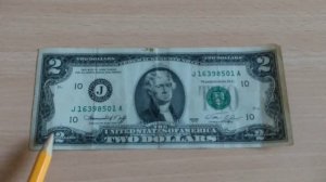 Обзор на банкноту США номиналом в 2 доллара 1976 года.