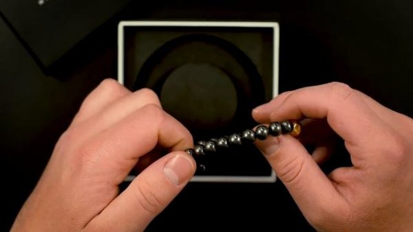 geom hematite gold bracelet