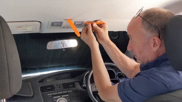 BL Mazda 3 (2009 to 2013): How to remove and replace the interior light. смотреть онлайн