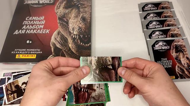 Jurassic World. Распаковка и пополнение коллекции наклеек от Panini. Серия 4